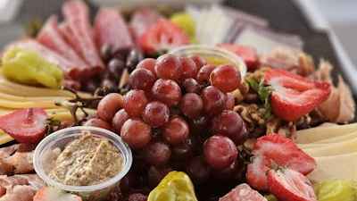 a bowl of fruit on a plate