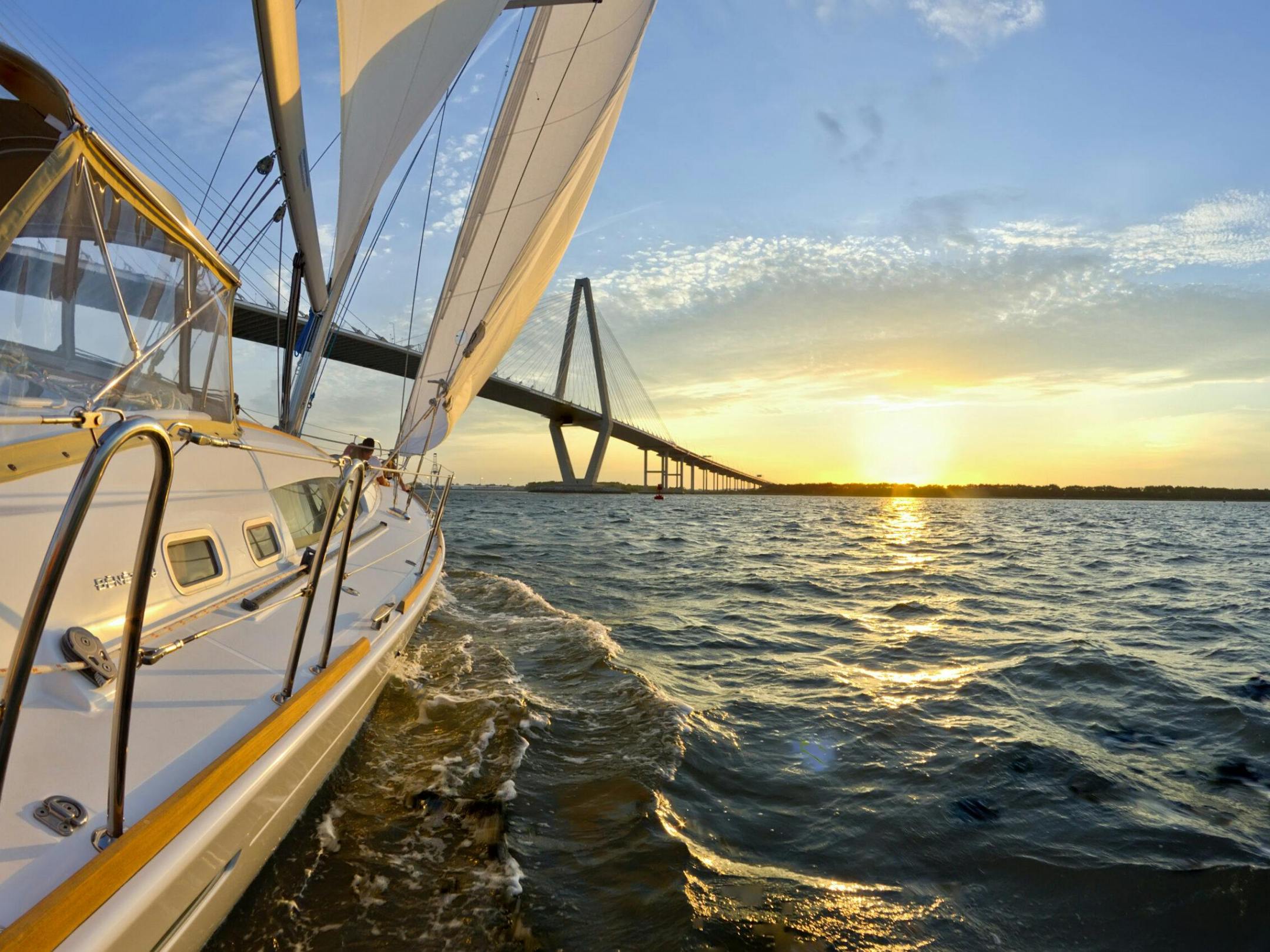a close up of a boat next to a body of water