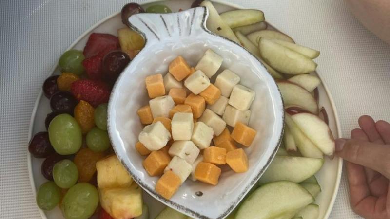 a bowl of fruit on a plate