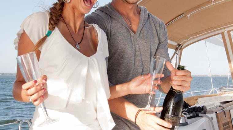 a woman holding a glass of wine