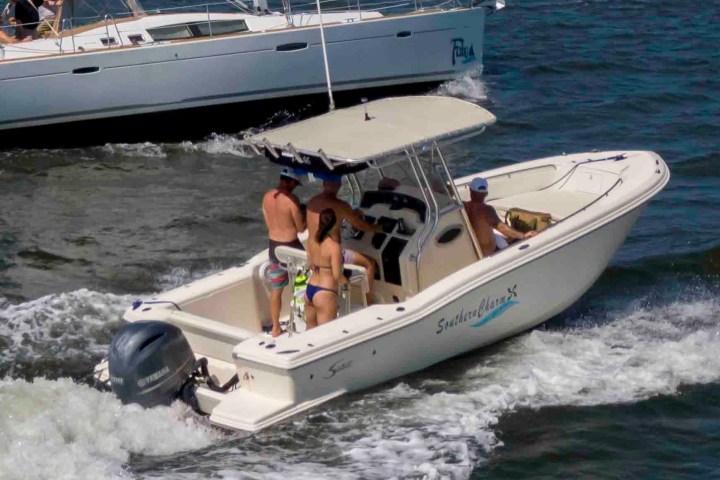 a small boat in a body of water