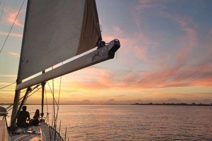 a close up of a boat next to a body of water