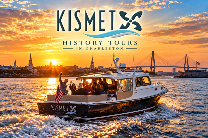 Boat with passengers on water at sunset with cityscape and bridge in background.